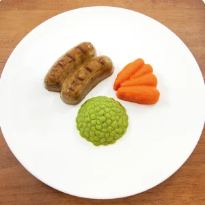 Shape It Pork, Herb and Honey Pureed Sausages with pureed Peas and Carrots